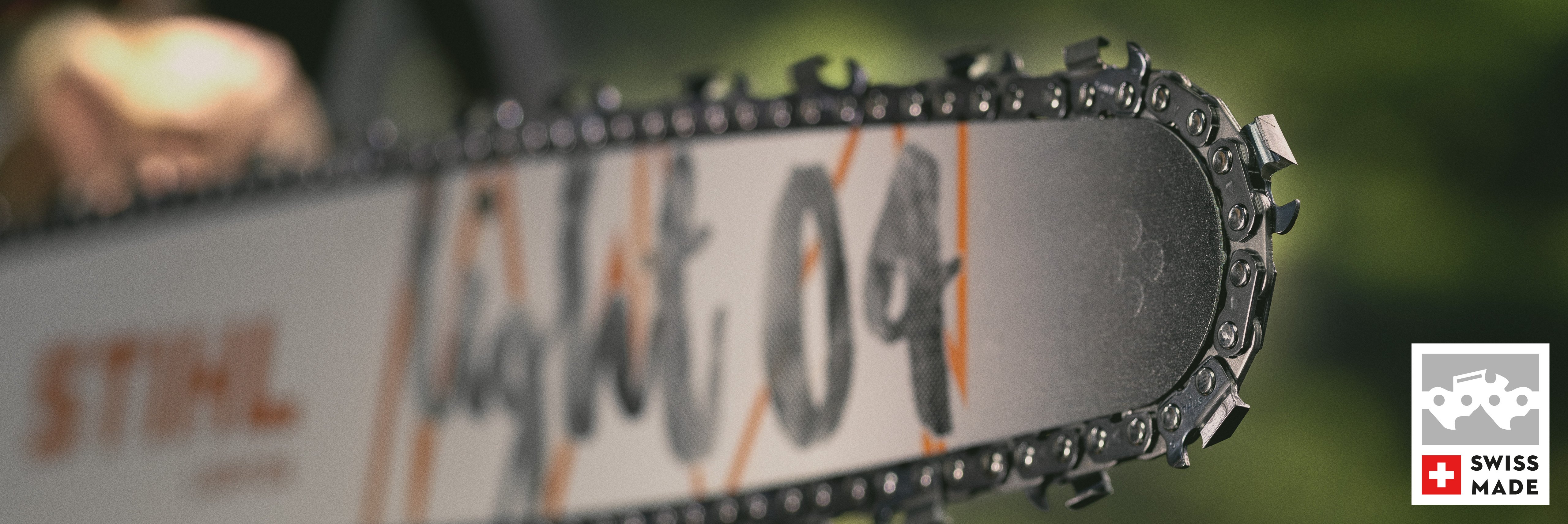  Zdjęcie makro prowadnicy Light 04 i łańcucha Super 36 RS ze szwajcarskim logo producenta
